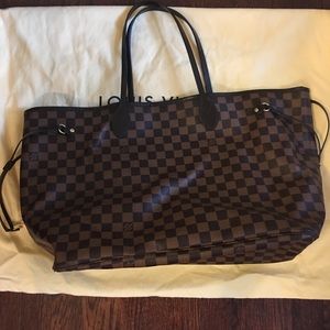 This is a 2016 Louis Vuitton GM Neverfull Bag.
